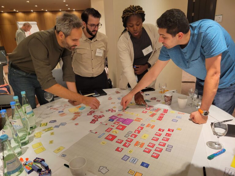 Participants work in groups to design their own emergency department.